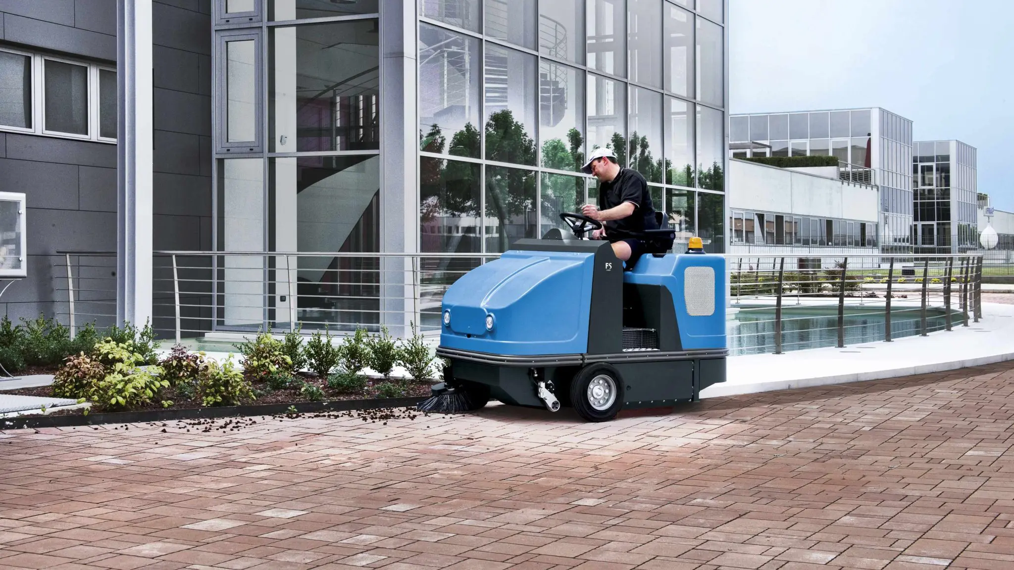 Scrubbing a retail centre floor instead of hosing it