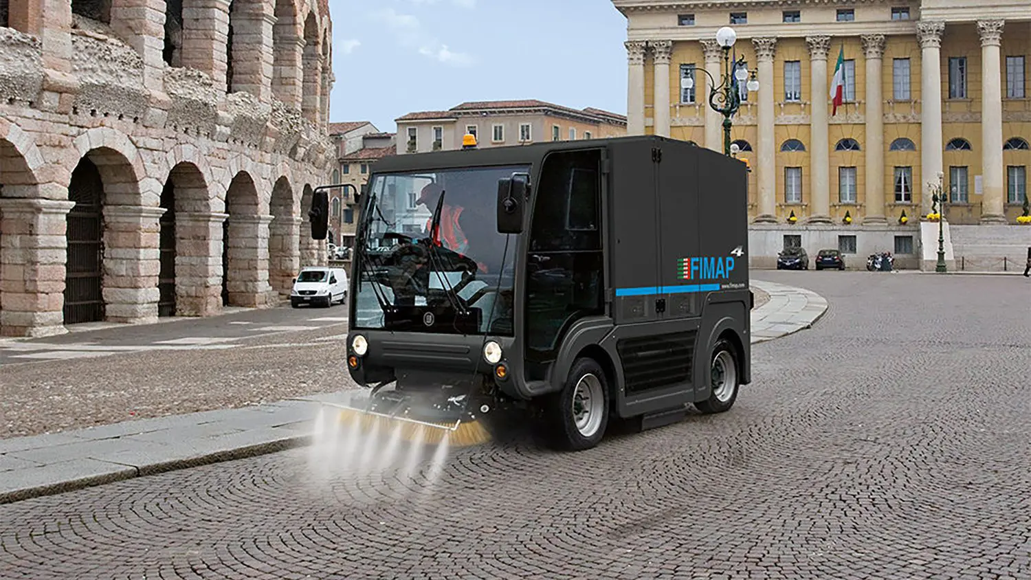 Road sweeper truck working on an estate street